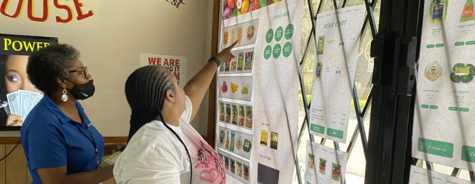 Residents interact with the healthy vending machine prototype